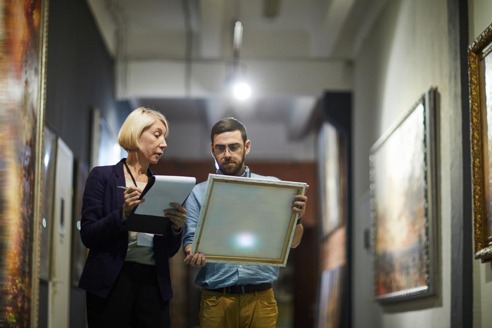 Before finalizing a purchase, have experts carefully examine the piece to confirm its authenticity. (SeventyFour/Shutterstock)