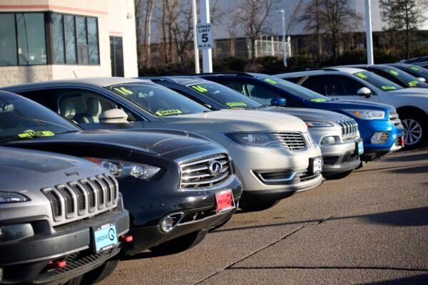 Used vehicles sit in a storage lot at a Toyota dealership in Englewood, Colo. on Feb. 27, 2022. (David Zalubowski/AP Photo)