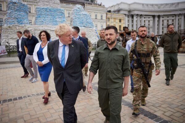 British Prime Minister Boris Johnson and Ukraine's President Volodymyr Zelenskyy walk at Mykhailivska Square, in Kyiv, Ukraine, on June 17, 2022. (Ukrainian Presidential Press Service via Reuters)