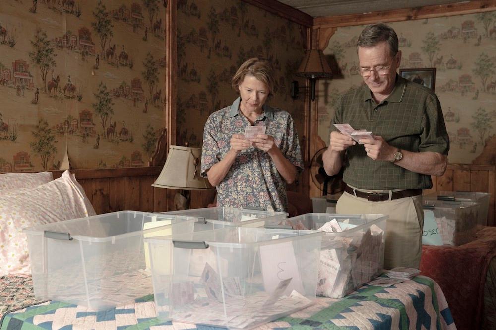 Marge (Annette Bening) and Jerry (Bryan Cranston) systematically locating the needle in the haystack, in “Jerry and Marge Go Large.”(Jake Giles Netter/Paramount+)