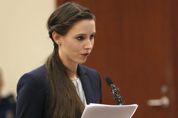 Rachael Denhollander speaks as former Michigan State University and USA Gymnastics doctor Larry Nassar listens to impact statements during the sentencing phase in Ingham County Circuit Court in Lansing, Mich., on Jan. 24, 2018. (Jeff Kowalsky/AFP via Getty Images)