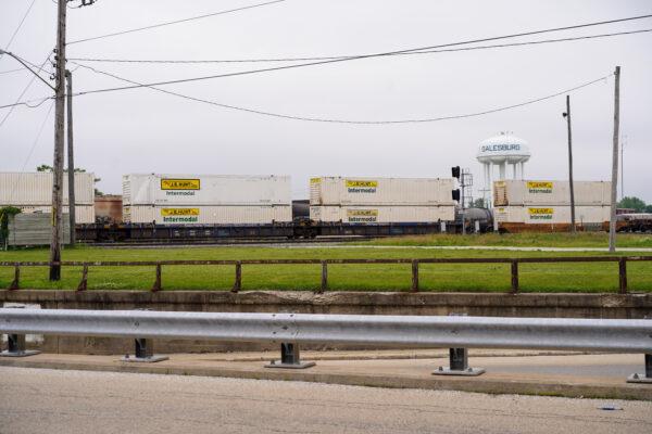 Freight trains carrying shipping containers pass through the city of Galesburg, the largest city in Knox County, lll., on June 7, 2022. (Cara Ding/The Epoch Times)