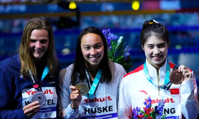 Huske, Dressel, Walsh Win More US Golds at Swimming Worlds