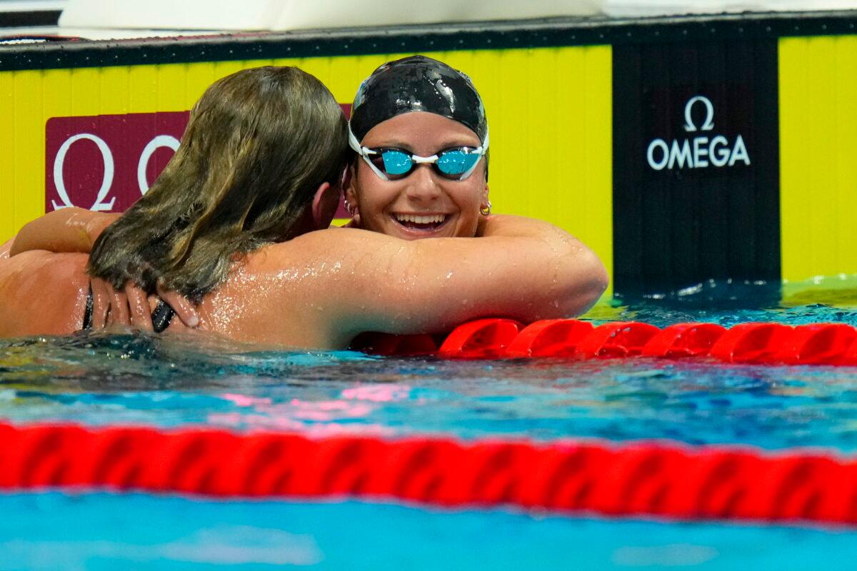 Second placed Katie Grimes of the United States celebrates with winner Katie Ledecky (L), also of the United States, after finishing the Women 1500m Freestyle final at the 19th FINA World Championships in Budapest, Hungary, on June 20, 2022. (Petr David Josek/AP Photo)