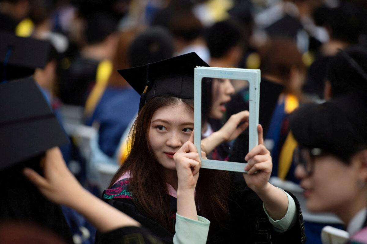 Graduates, including students who could not attend last year due to the COVID-19 pandemic, attend a graduation ceremony at Central China Normal University in Wuhan, Hubei province, China, on June 13, 2021. (Stringer/Reuters)