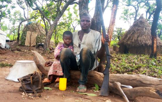 Shehu Mu’azu, a previously displaced farmer, is now part of a group that tries to protect villagers from terrorists and bandits. (Courtesy of Masara Kim)