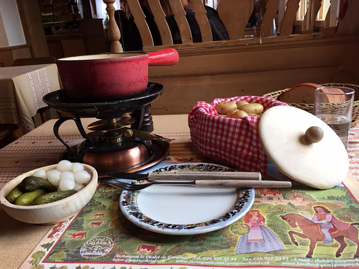 Traditional Swiss fondue in village of Gruyere, Switzerland. (Carol Ann Davidson/TNS)