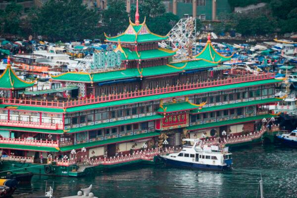 Hong Kong’s iconic Jumbo Floating Restaurant is towed away in Hong Kong on June 14, 2022. (Kin Cheung/AP Photo)