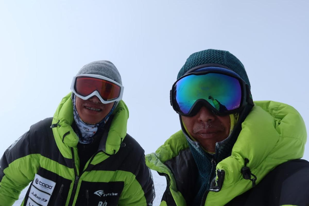 Bob and his father John climbed Mt. Denali, the highest mountain in North America on June 12 2022. (Courtesy of the Tsang family)