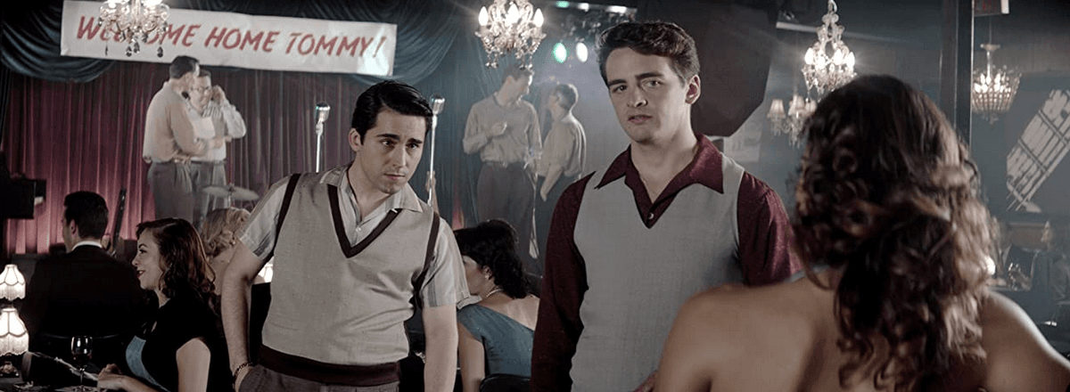 (L–R) Frankie Valli (John Lloyd Young), Tommy DeVito (Vincent Piazza), and Mary Delgado (Renée Marino), in “Jersey Boys.” (Malpaso Productions/Warner Bros.)