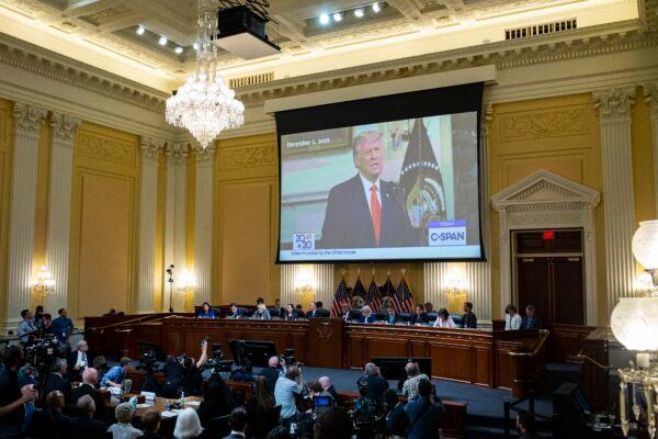 Former President Donald Trump is displayed on a screen during the fourth hearing on the Jan. 6 investigation in the Cannon House Office Building in Washington on June 21, 2022. (Al Drago/Pool via Getty Images)