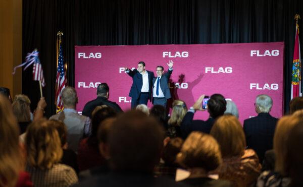 Adams celebrates his citizenship with family friend and mentor Congressman Gus Bilirakis of Florida. (Tex Fischer / H&F Strategies)