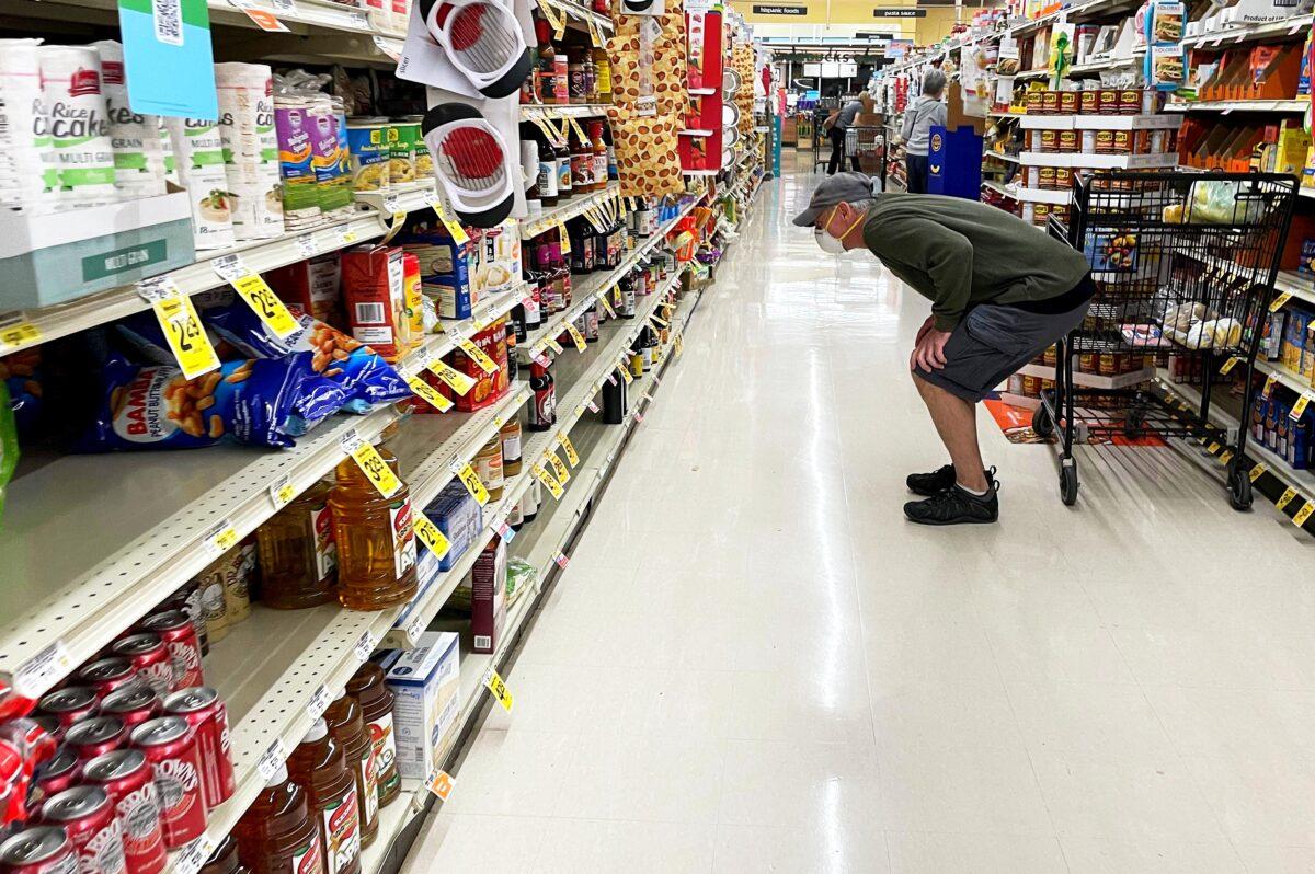 A man shops at a Safeway grocery store in Annapolis, Md., on May 16, 2022. (Jim Watson/AFP via Getty Images)
