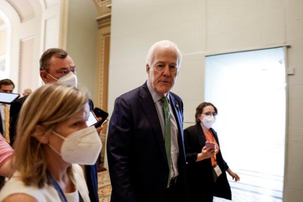 Sen. John Cornyn (R-Texas) speaks to reporters as he walks to the Senate Chambers of the U.S. Capitol in Washington, on June 21, 2022. (Anna Moneymaker/Getty Images)
