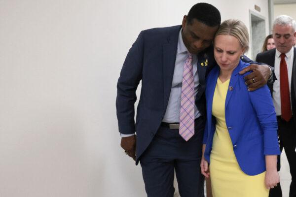 Rep. Burgess Owens (L) (R-Utah) hugs Rep. Victoria Spartz (R-Ind.) following a press conference on the State of the Union speech to be delivered by U.S. President Joe Biden later this evening on March 01, 2022 in Washington, DC. Ukrainian born Spartz delivered an emotional appeal for further U.S. support for Ukraine during the press conference. (Win McNamee/Getty Images)