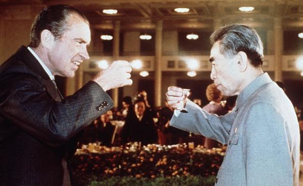  President Richard Nixon (L) toasts with Chinese Prime Minister Chou En Lai in February 1972 in Beijing during his official visit to China. (AFP via Getty Images)