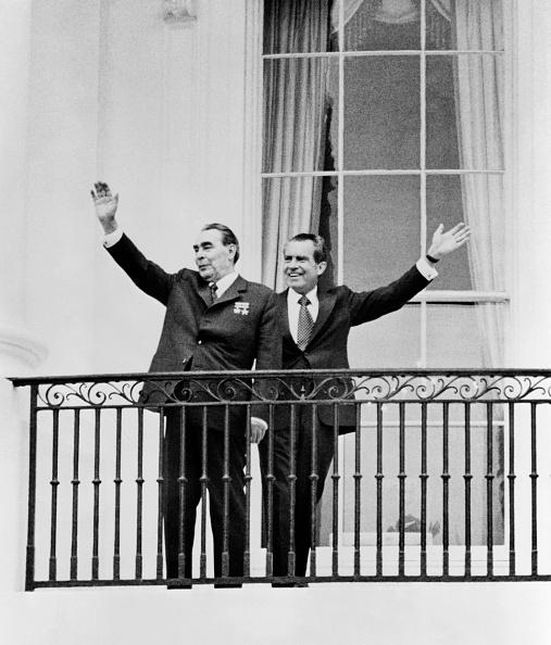  General Secretary of the Communist Party of the Soviet Union Leonid Brezhnev (L) and U.S. President Richard Nixon wave at the balcony of the White House, on June 18, 1973, in Washington, during Brezhnev's official visit to the United States.  (AFP via Getty Images)
