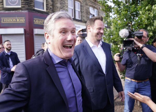 Labour leader Sir Keir Starmer meets with new Wakefield MP Simon Lightwood in Ossett Market, West Yorkshire, on June 24, 2022. (Danny Lawson /PA Media)