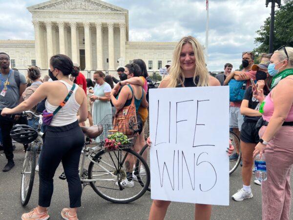 Students For Life of America’s digital engagement strategist Anna Lulis at the U.S. Supreme Court in Washington on June 24, 2022. (Emel Akan/The Epoch Times)