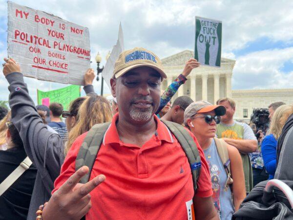 Pro-abortion protester John Johnson at the U.S. Supreme Court in Washington on June 24, 2022. (Emel Akan/The Epoch Times)