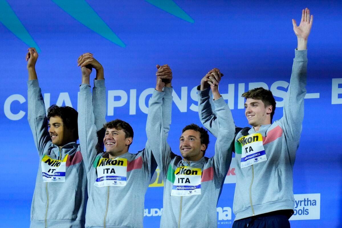 Team of Italy celebrates after winning the men's 4x100m medley relay at the 19th FINA World Championships in Budapest, Hungary, on June 25, 2022.AP Photo/Petr David Josek/AP Photo)