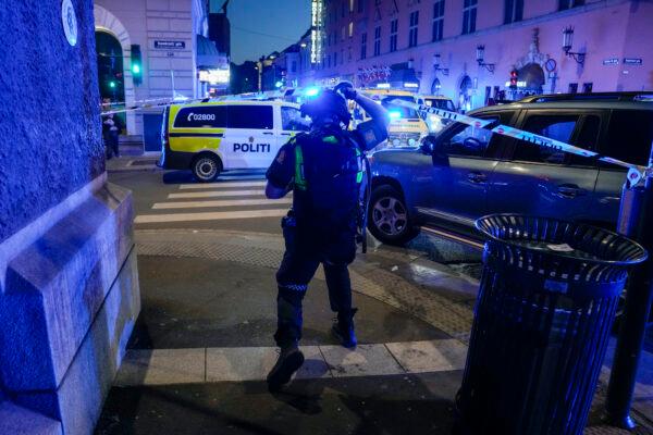 Police gather at the site of a mass shooting in Oslo, Norway, on June 25, 2022. (Javad Parsa/NTB via AP)