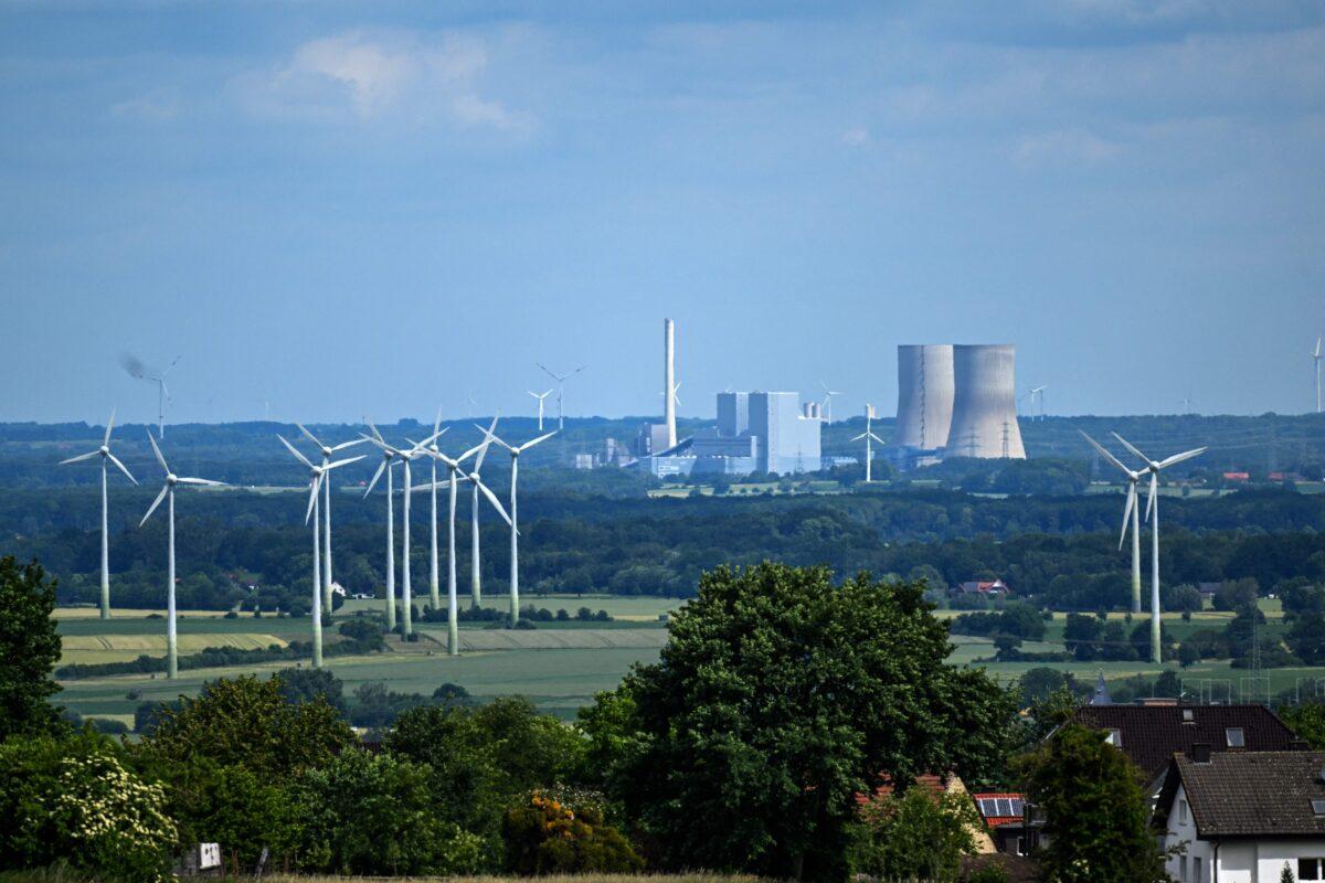 Wind turbines near a coal-fired power plant, near Hamm, Germany, on June 8, 2022. (Ina Fassbender/AFP via Getty Images)