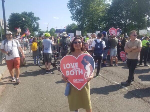 Sheyla Tellez demonstrates against abortion in Washington on June 26, 2022. (Nathan Worcester/The Epoch Times)