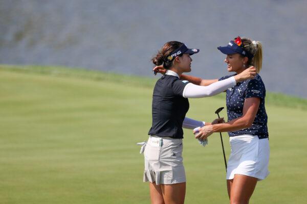 Lexi Thompson (R) of the United States congratulates In Gee Chun (L) of South Korea on her win on the 18th green during the final round of the KPMG Women's PGA Championship at Congressional Country Club, in Bethesda, Maryland, on June 26, 2022. (Rob Carr/Getty Images)