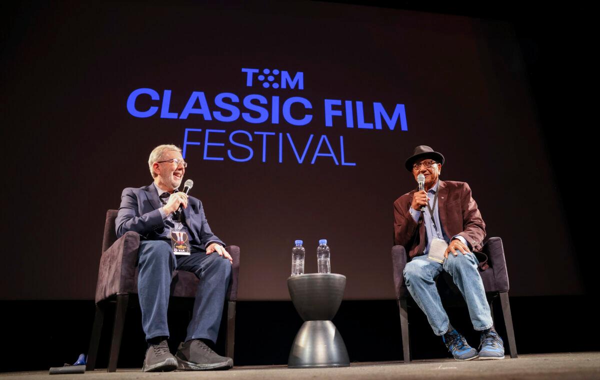Leonard Maltin and Floyd Norman speak onstage at the screening of The Jungle Book (1967) at the El Capitan Theatre during the 2022 TCM Classic Film Festival in Hollywood, California. (Getty Images for TCM)