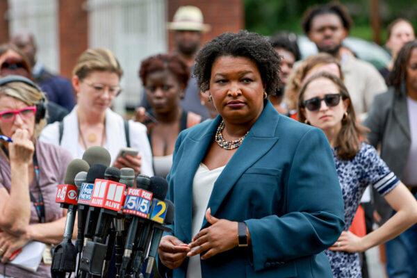 Stacey Abrams became a national figure after losing to Brian Kemp in 2018 but appeared Tuesday night to be headed for defeat in a rematch for Georgia governor. Here she speaks to the media during a press conference at the Israel Baptist Church in Atlanta, on May 24, 2022. (Joe Raedle/Getty Images)