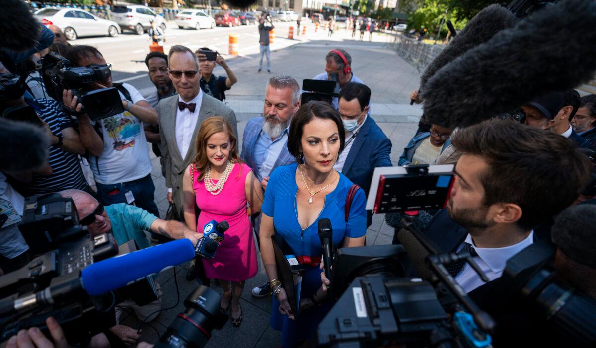 Sarah Ransome, an alleged victim of Jeffrey Epstein and Ghislaine Maxwell, right, alongside Elizabeth Stein, left, speak to members of the media outside federal court in New York, on June 28, 2022. (John Minchillo/AP Photo)