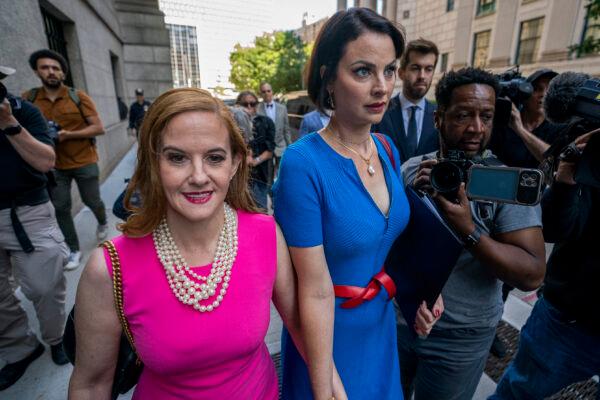 Sarah Ransome, an alleged victim of Jeffrey Epstein and Ghislaine Maxwell, right, alongside Elizabeth Stein, left, walk to federal court, in New York, on June 28, 2022. (John Minchillo/AP Photo)