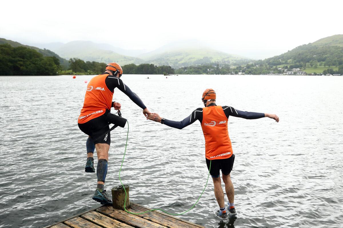 Athletes compete in the Great North Swim Run endurance race at Lake Windermere in Ambleside, England, on June 8, 2019. (Bryn Lennon/Getty Images)