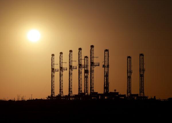 Drilling rigs sit unused on a companies lot located in the Permian Basin area in Odessa, Texas, on March 13, 2022. (Joe Raedle/Getty Images)