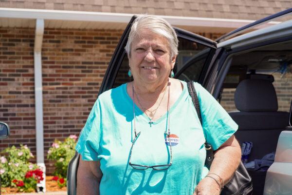 Elevera Werr stands outside of a polling site in Palos Hills, Ill., on June 28, 2022. (Cara Ding/The Epoch Times)