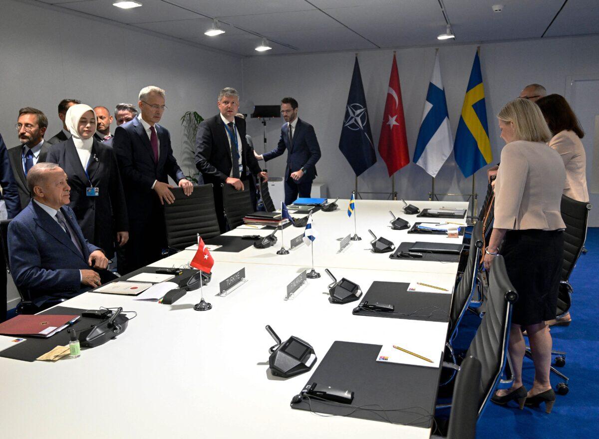 Turkey's President Recep Tayyip Erdogan (L), NATO Secretary General Jens Stoltenberg (C), and Sweden's Prime Minister Magdalena Andersson take part in a meeting on the sidelines of the NATO summit in Madrid, on June 28, 2022. The leaders of Finland and Sweden met Erdogan ahead of a NATO summit in Madrid to try to get him to drop objections to them joining, Swedish and Finnish officials said. (Henrik Montgomery/TT News Agency/AFP via Getty Images)