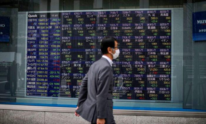 World Stocks Skid as Consumer Data Flashes Recession Worry