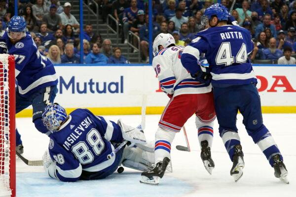 Tampa Bay Lightning goaltender Andrei Vasilevskiy (88) falls on a shot by New York Rangers center Ryan Strome (16) during the first period in Game 3 of the NHL hockey Stanley Cup playoffs Eastern Conference finals in Tampa, Fla., on June 5, 2022. (Chris O'Meara/AP Photo)