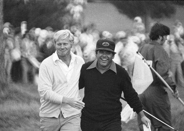 Jack Nicklaus (L) with Lee Trevino, walks off the 18th green after winning the U.S. Open golf tournament in Pebble Beach, Calif. on June 18, 1972. (AP Photo)