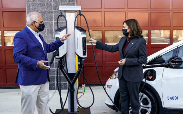 Vice President Kamala Harris speaks with SemaConnect CEO Mahi Reddy at the Prince George's County Brandywine Maintenance Facility during a visit to announce the Biden administration’s Electric Vehicle Charging Action Plan, in Brandywine, Md., on Dec. 13, 2021. (Kevin Lamarque/Reuters)