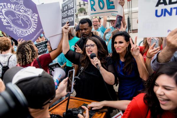 Pro-life leaders Kristan Hawkins (C) and Penny Nance (R) celebrate the overturning of Roe v. Wade in Washington on June 24, 2022. (Courtesy of Students for Life of America)