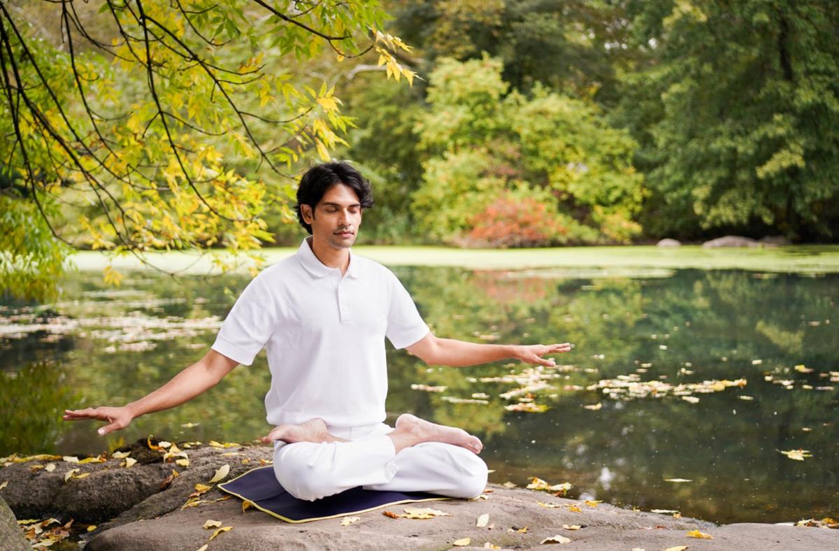 A meditator in Central Park. Falun Gong's popularity was such that between 70 million to 100 million people took up the practice within a decade. (Samira Bouaou)