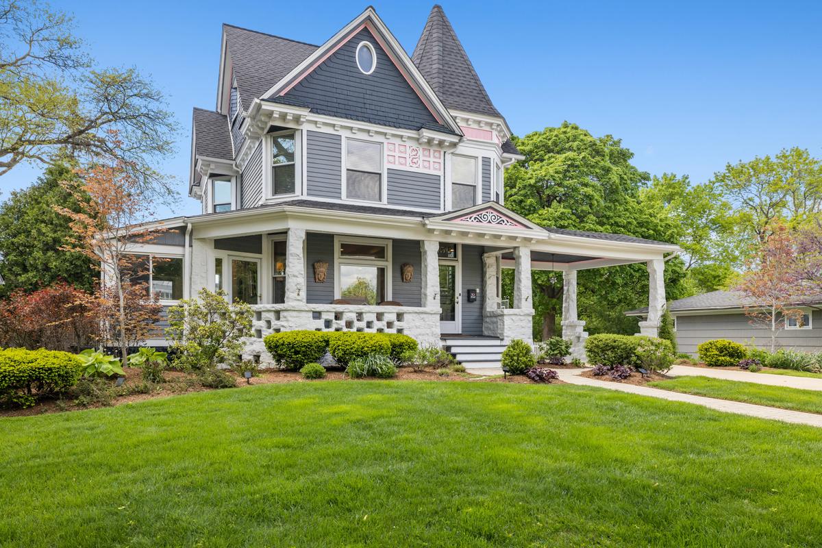 Located in the heart of one of Chicago’s most coveted suburban villages, this Queen Anne Victorian home enjoys views of nearby Randall Park. (Courtesy of Baird & Warner)