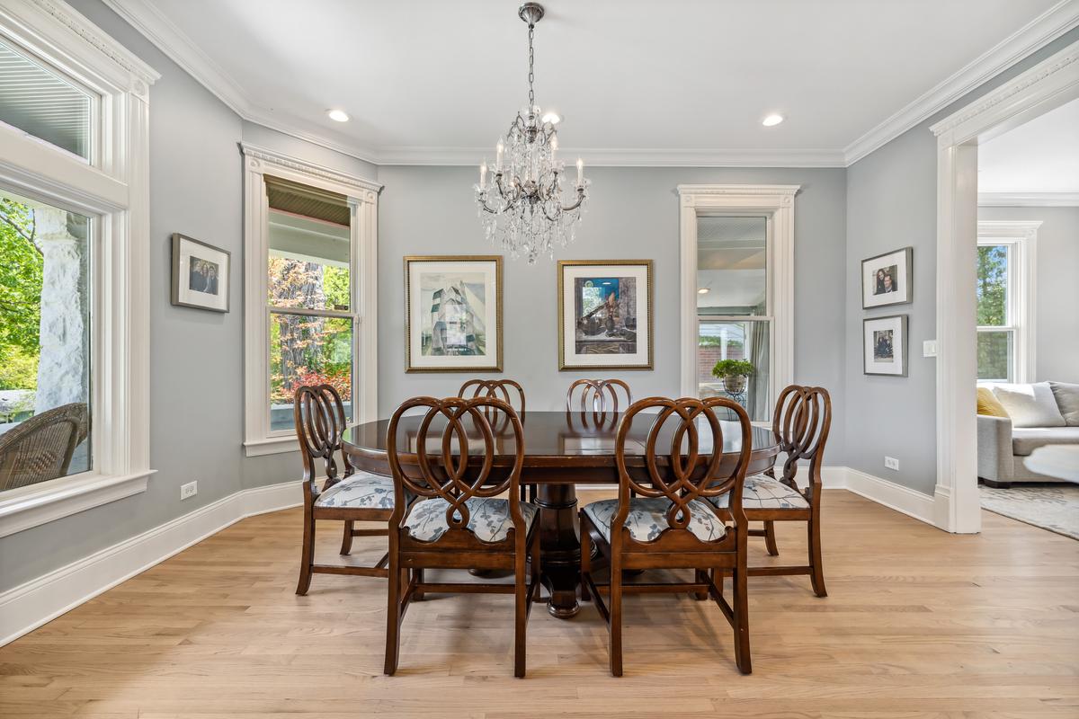 The formal dining room exhibits classic Victorian style and craftsmanship. (Courtesy of Baird & Warner)