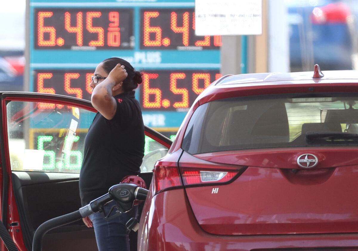 A customer pumps gas into their car at a gas station in Petaluma, Calif., on May 18, 2022.<br/>(Justin Sullivan/Getty Images)