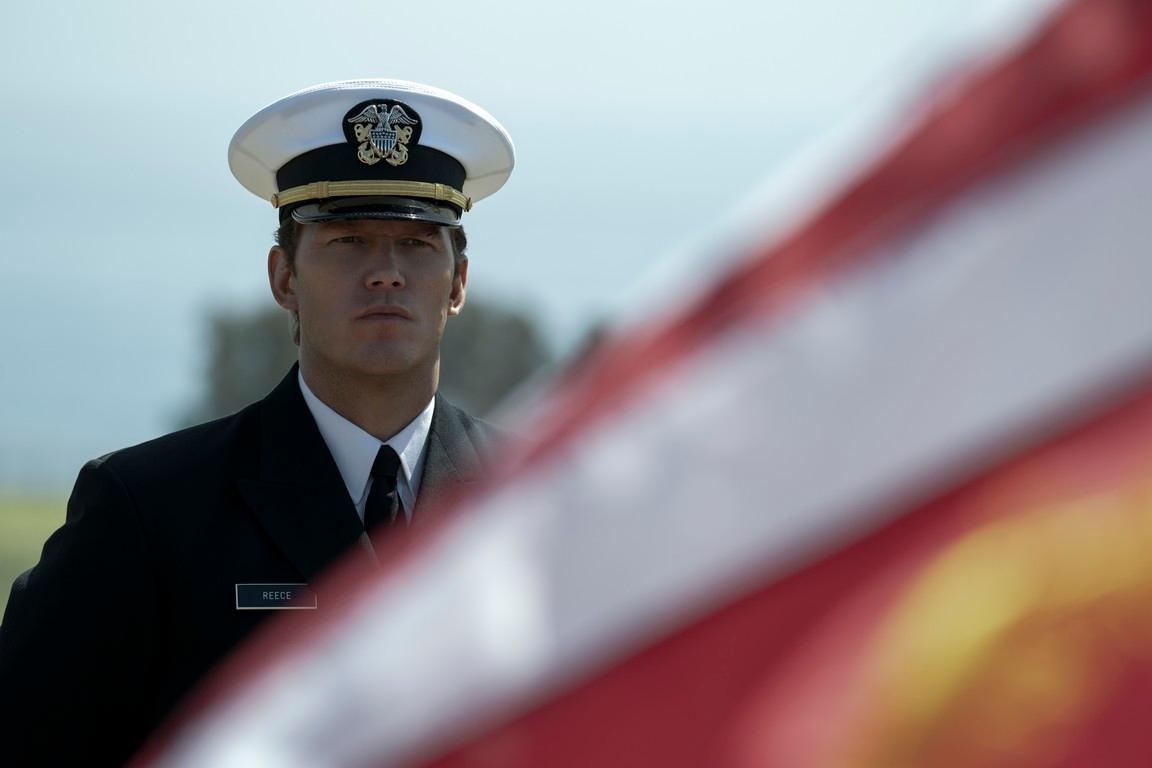Lt. Cmdr. James Reece (Chris Pratt), attending a succession of funerals for his fallen comrades in arms, in "The Terminal List." (Fuqua Films/Amazon Studios)