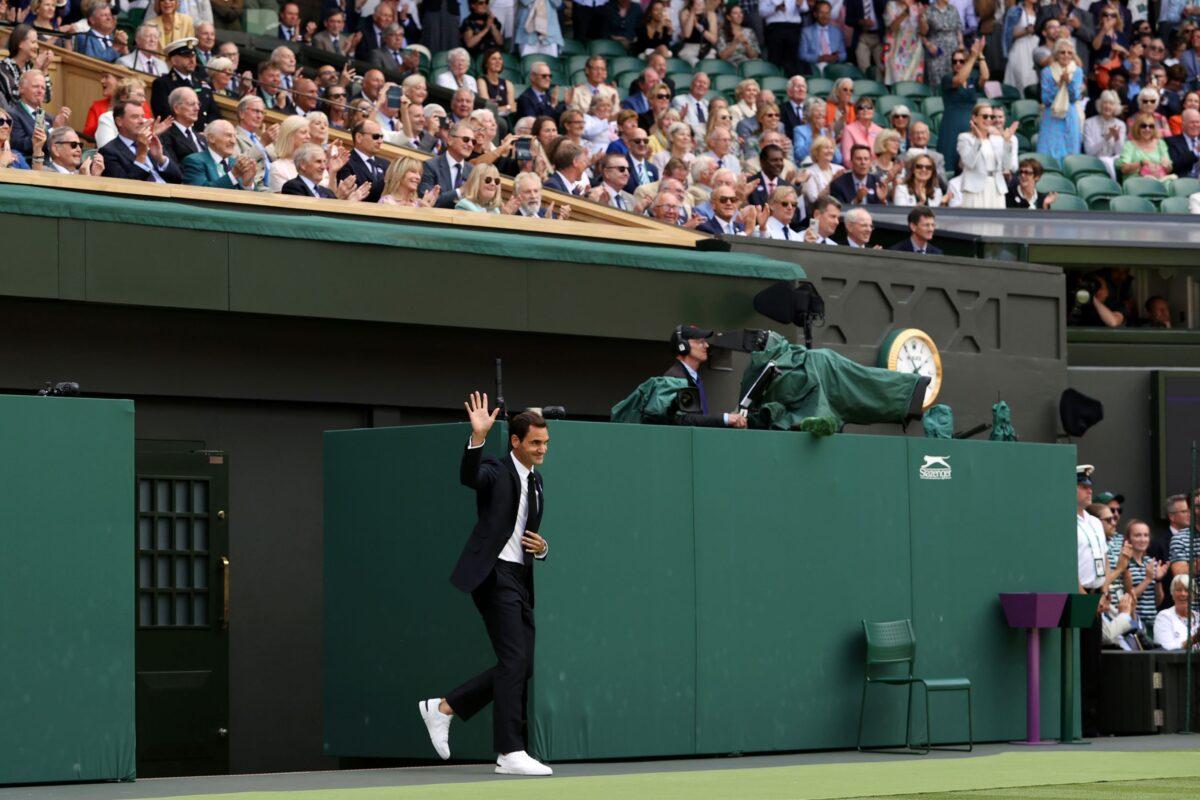Roger Federer of Switzerland acknowledges spectators at the Centre Court Centenary Celebration on day seven of The Championships Wimbledon 2022 at All England Lawn Tennis and Croquet Club in London on July 3, 2022. (Ryan Pierse/Getty Images)