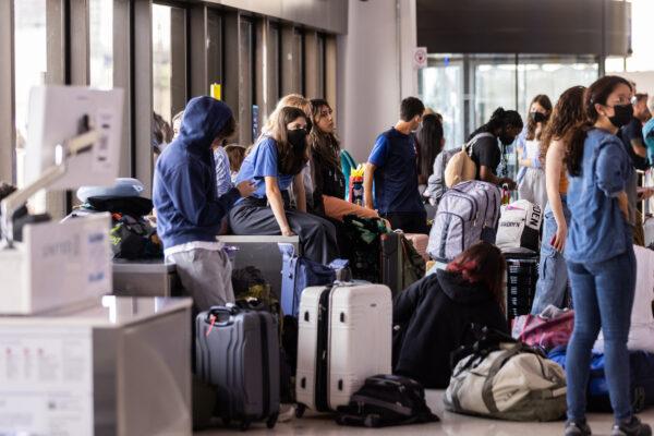 Travelers wait at Newark Liberty International Airport in Newark, New Jersey, on July 1, 2022. (Jeenah Moon/Getty Images)