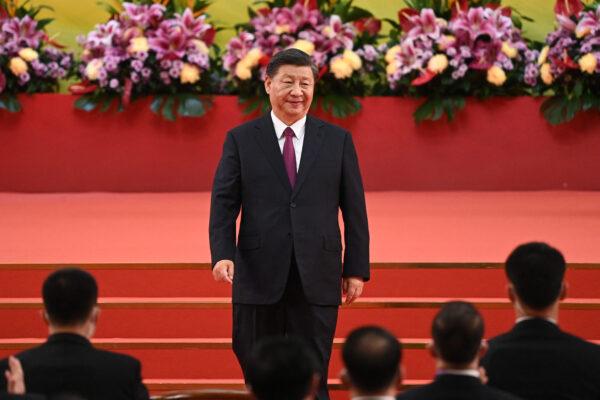 China's leader Xi Jinping leaves the podium following his speech in Hong Kong on July 1, 2022, (Selim Chtayti/POOL/AFP via Getty Images)